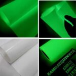 detalhe rolo do filme de recorte brilha no escuro e aplicação em tecido com efeito de luminescência verde